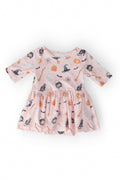 Mila & Rose Hey Boo twirl bodysuit shown flat on white, printed with ghosts, bats, webs and jack-o'-lanterns on a blush pink ground.